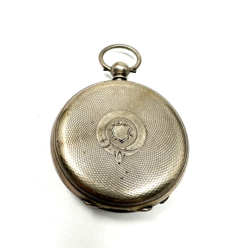 485 - Antique silver open face pocket watch the watch is ticking