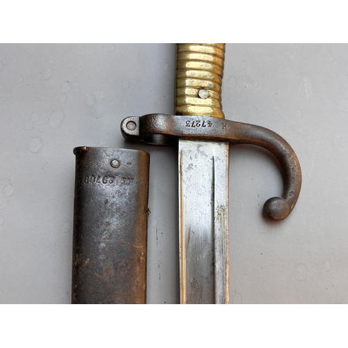 78 - French 1866 pattern sabre bayonet engraved on back edge of blade St Etienne juin 1869 length 71cm