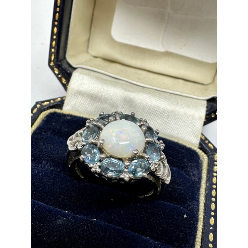 169 - 9ct white gold opal & topaz ring 4.1g