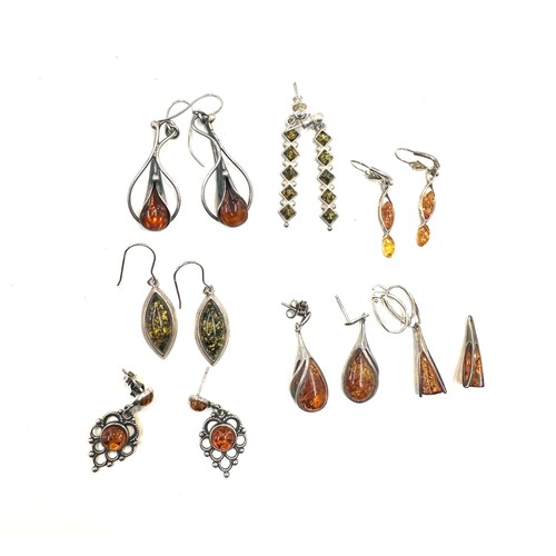 429 - Selection of amber earrings