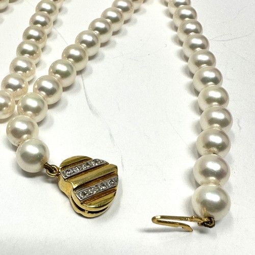 165 - 14ct gold diamond set clasp cultured pearl single strand necklace (25.9g)