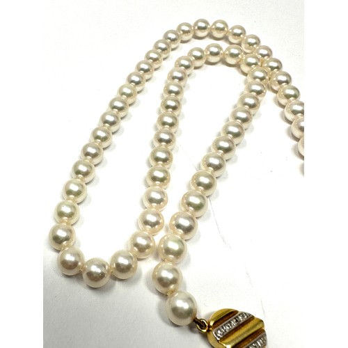 165 - 14ct gold diamond set clasp cultured pearl single strand necklace (25.9g)