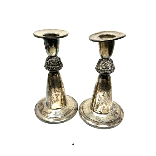 116 - Pair of irish silver candlesticks height 14cm filled base