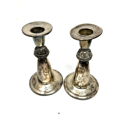 116 - Pair of irish silver candlesticks height 14cm filled base