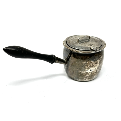 112 - Antique silver sauce / brandy pan ebony handle pot measures approx height 5cm dia 5.5cm Birmingham s... 