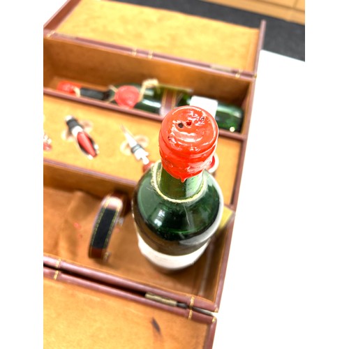 575 - Leather cased vintage Merlot wine set