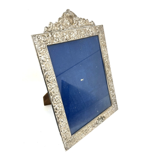 104 - Large Vintage silver picture frame measures approx 35cm by 24cm