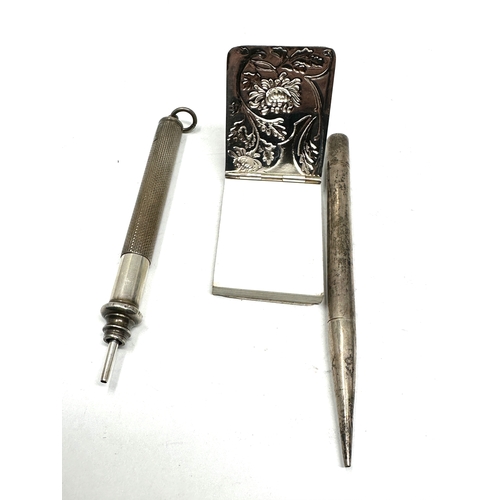 136 - Small silver notepad & 2 silver pencils