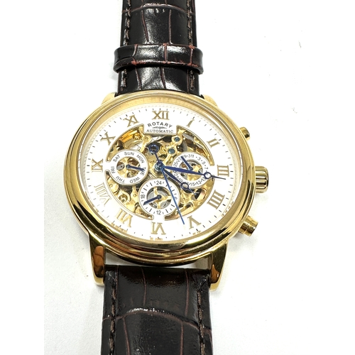 452 - Rotary calendar gents gold tone skeleton movement automatic wristwatch