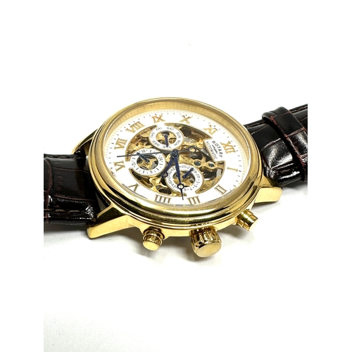 452 - Rotary calendar gents gold tone skeleton movement automatic wristwatch