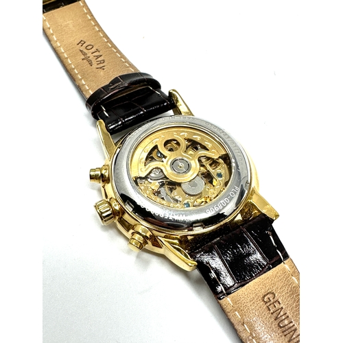 452 - Rotary calendar gents gold tone skeleton movement automatic wristwatch