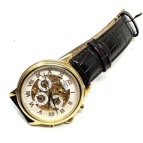 452 - Rotary calendar gents gold tone skeleton movement automatic wristwatch