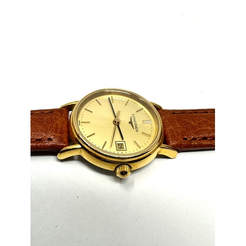 450 - Longines ladies gold tone quartz wristwatch ref l4.136.2 the watch is ticking