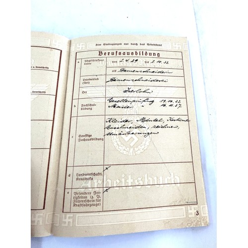 572 - WW2 Nazi German passport along with a related medal