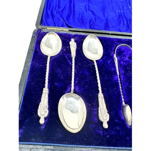 25 - Boxed set of 6 silver tea spoons & sugar tongs