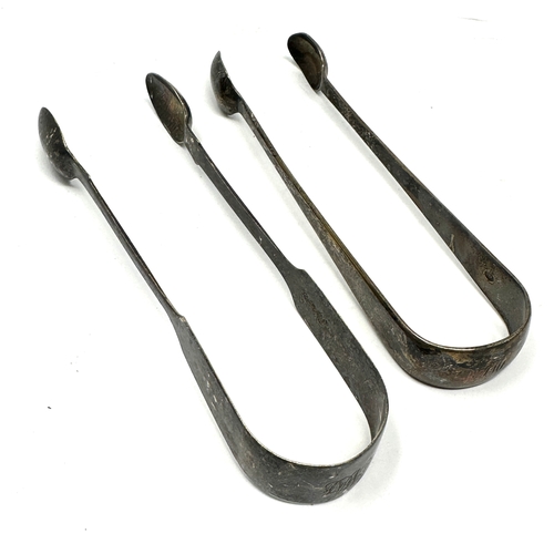 17 - 2 georgian silver sugar tongs