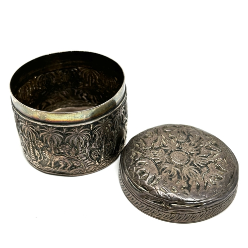 51 - Indian silver lidded circular box measures approx 6cm dia height 5cm