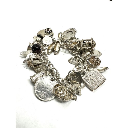 356 - .925 vintage charm bracelet with assorted charms (125g)