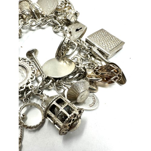 356 - .925 vintage charm bracelet with assorted charms (125g)