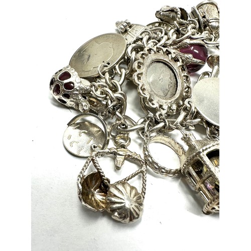 356 - .925 vintage charm bracelet with assorted charms (125g)