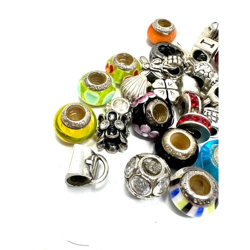 345 - 40 x .925 assorted branded charms (119g)