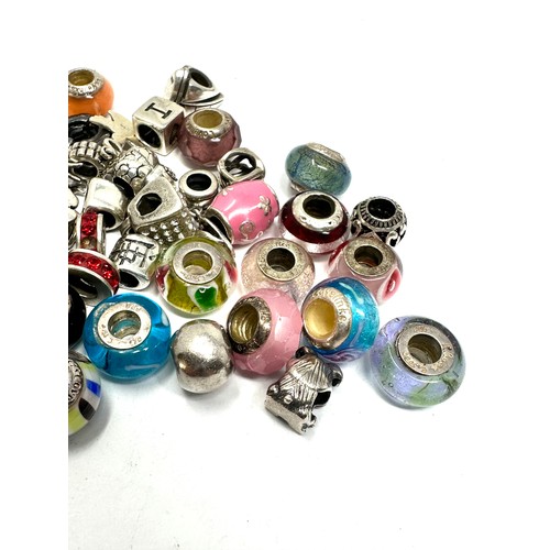 345 - 40 x .925 assorted branded charms (119g)