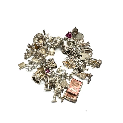 318 - .925 vintage charm bracelet with assorted charms (142g)