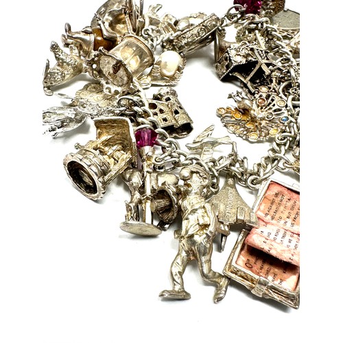 318 - .925 vintage charm bracelet with assorted charms (142g)