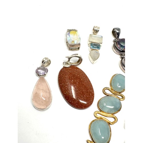 361 - 8 x .925 gemstone set pendants (89g)