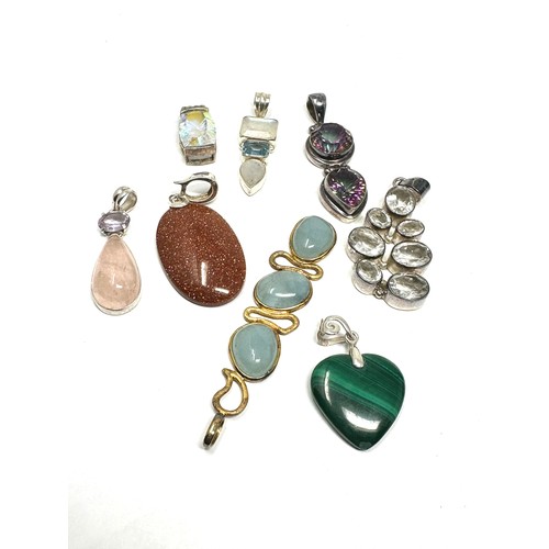 361 - 8 x .925 gemstone set pendants (89g)