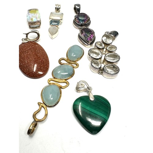 361 - 8 x .925 gemstone set pendants (89g)