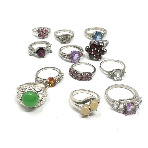 335 - 12 x .925 gemstone rings (49g)