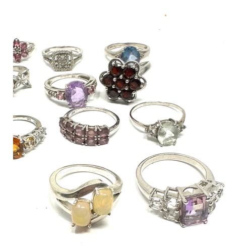 335 - 12 x .925 gemstone rings (49g)