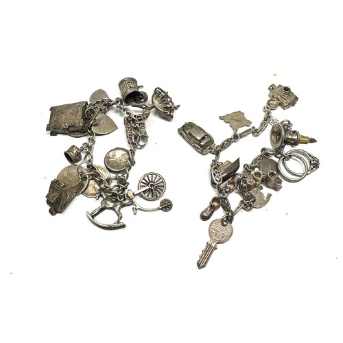 338 - 2 x .925 vintage charm bracelets with assorted charms (72g)