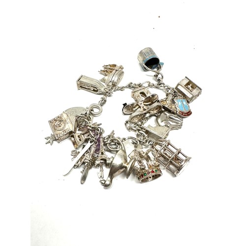 324 - .925 vintage charm bracelet with assorted charms (67g)