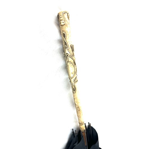 450 - Antique carved bone handle umbrella