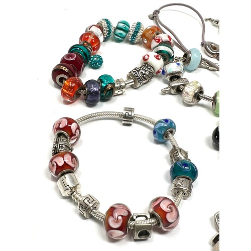 346 - 8 x .925 assorted branded charm bracelets and charms (190g)