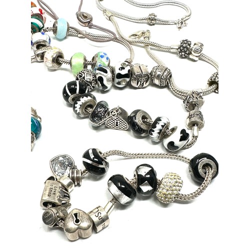 346 - 8 x .925 assorted branded charm bracelets and charms (190g)