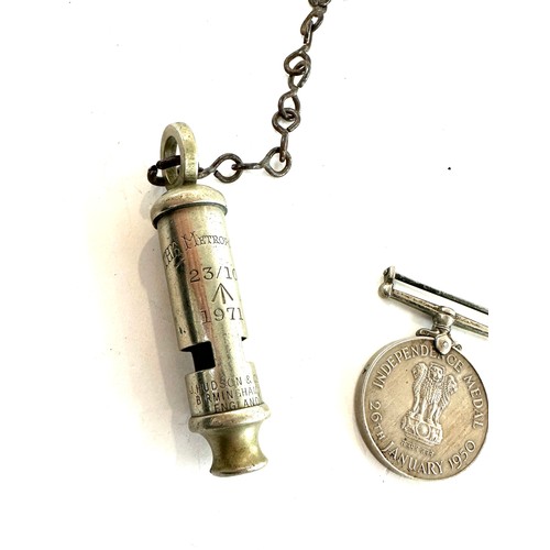 439 - Military The Metropolian J.Hudson and co 1970 whistle and a indian police force independance medal