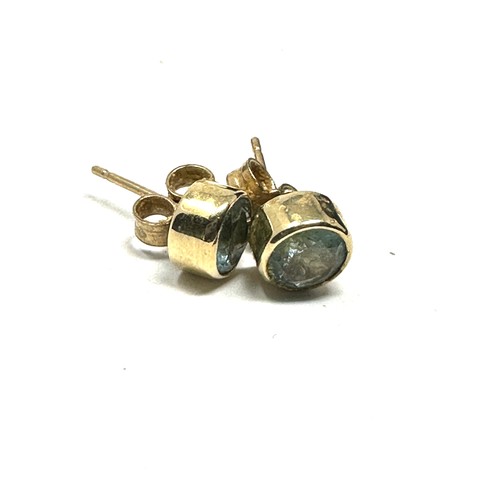 237 - 9ct gold blue topaz stud earrings (1.2g)