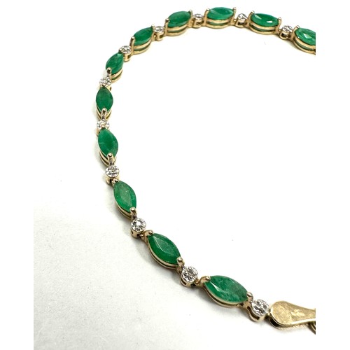 223 - 10ct gold diamond & emerald link bracelet (4.2g)