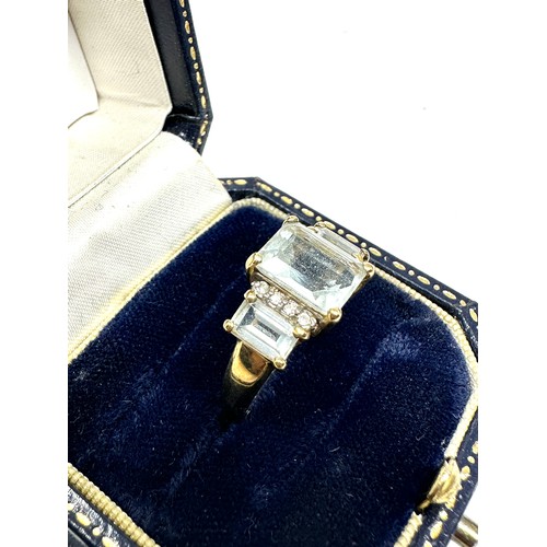 197 - 9ct gold blue quartz three stone ring with diamond accents (3.1g)