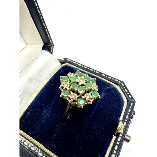 214 - 9ct gold diamond & emerald dress ring (3.3g)