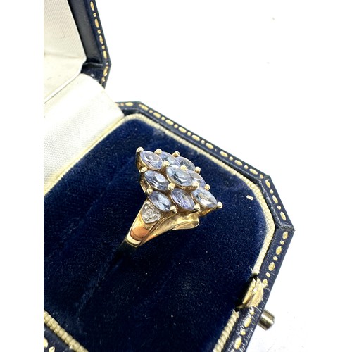 219 - 9ct gold diamond & tanzanite dress ring (2.5g)