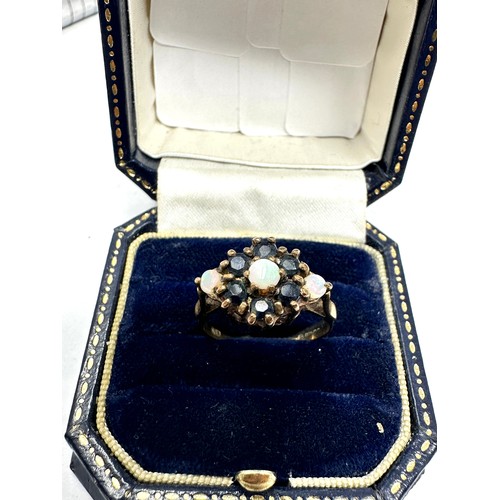 221 - 9ct gold sapphire & opal halo ring (3g)