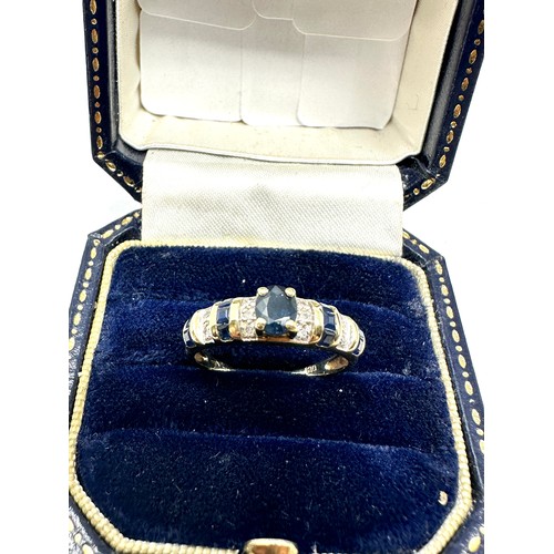 222 - 9ct gold diamond & sapphire dress ring (2.4g)