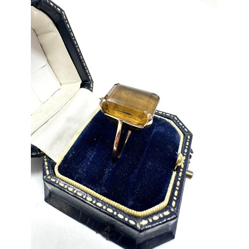 245 - 9ct gold smoky quartz single stone cocktail ring (7.2g)