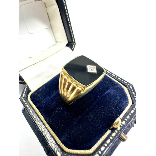 168 - 9ct gold diamond & onyx signet ring (3.8g)