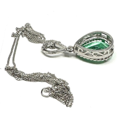 176 - 9ct white gold green stone pendant necklace (3.2g)