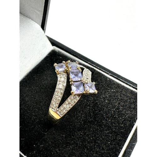 202 - 9ct gold vintage diamond and tanzanite set dress ring (2.2g)